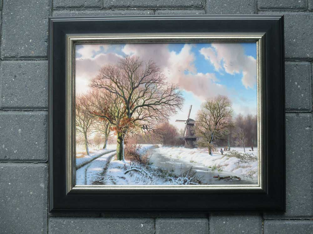 Daniel van der Putten, geb. 1949, winterlandschap met molen, olieverf op paneel, paneelmaat 28,5x35,5cm, afmeting incl. lijst 40x47cm, nr. 42